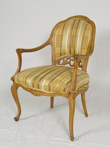 Appraisal: ITALIAN CARVED BERGERE CHAIR Graceful open arm chair soft colored