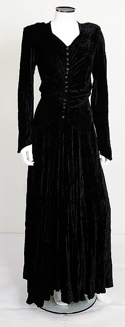 Appraisal: A s long black crushed velvet dress ruched detailing to