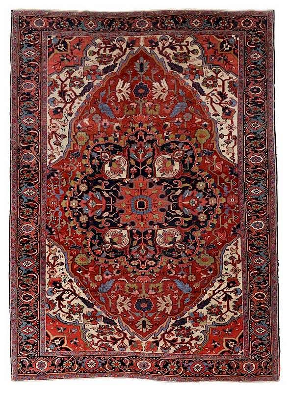 Appraisal: Heriz Carpet Persian early th century large multi-floral medallion red