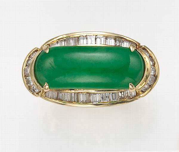 Appraisal: A jadeite jade diamond and fourteen karat gold saddle ring