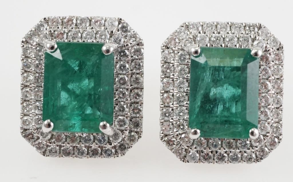 Appraisal: Platinum with faceted emeralds octagonal step cut approx ct and