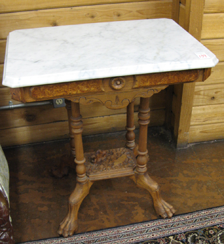 Appraisal: A VICTORIAN MARBLE-TOPPED LAMP TABLE American late th century having