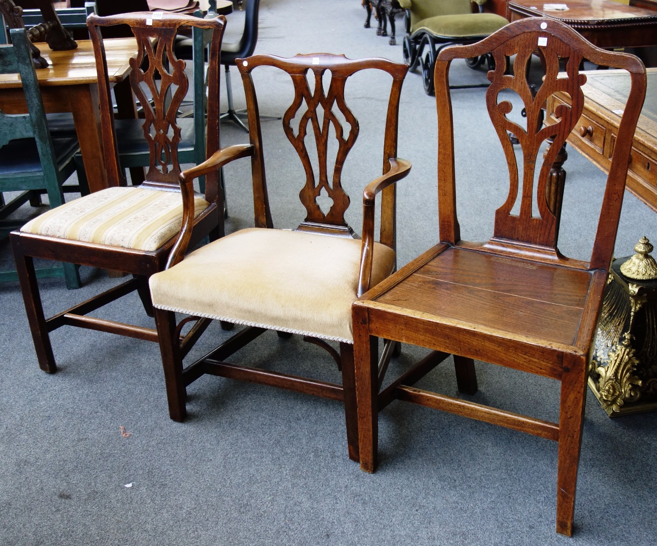 Appraisal: A set of six th century oak framed dining chairs