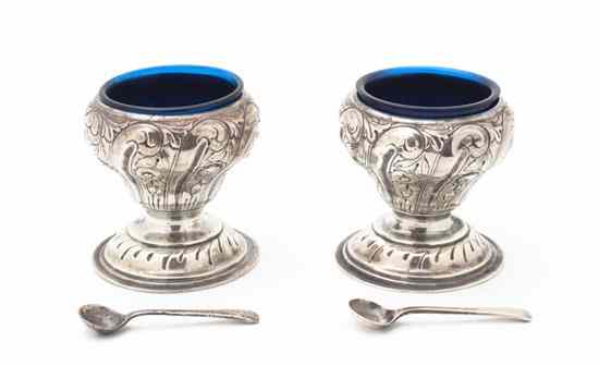 Appraisal: A Pair of English Silver Salt Cellars together with spoons