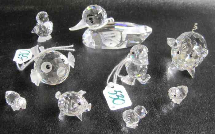 Appraisal: NINE SWAROVSKI CRYSTAL FIGURINES duck ''L fish pig and miniature