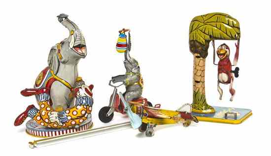 Appraisal: A Collection of Three Pressed Tin Mechanical Toys comprising a