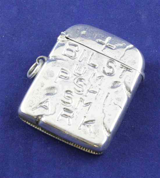 Appraisal: An Edwardian novelty silver vesta case modelled as a grave