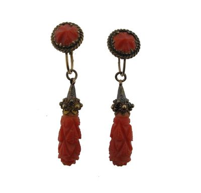 Appraisal: A pair of Victorian carved coral and gold drop earrings