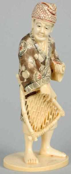 Appraisal: Carved Ivory Polychrome Fisherman Signed Exquisite detail Condition Excellent Size