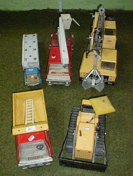 Appraisal: Five Tonka Toys fire engine bulldozer car transporter crane and