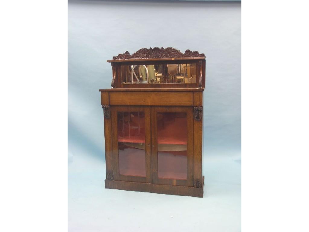 Appraisal: A William IV rosewood chiffonier mirrored overshelf with carved leaf