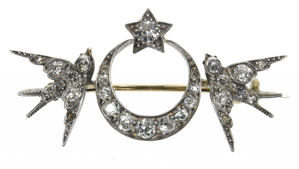 Appraisal: A DIAMOND BAR BROOCH the pav set crescent and star