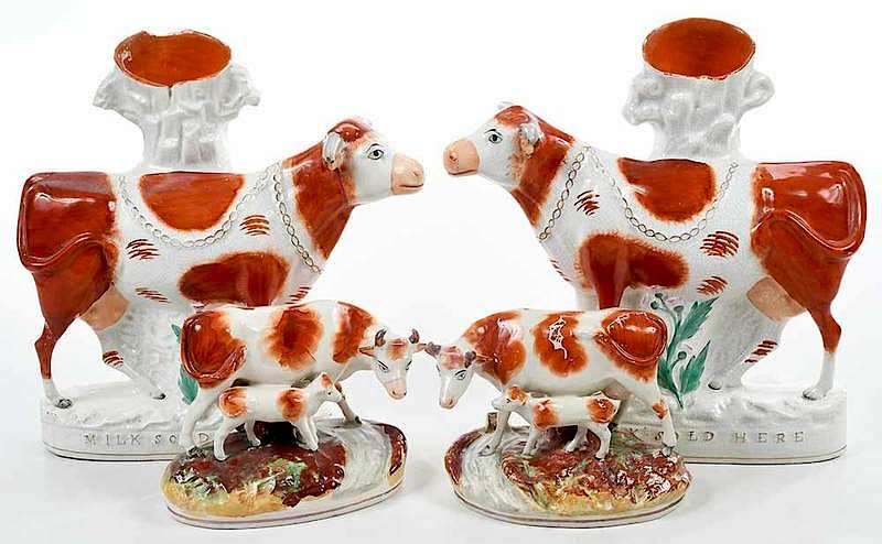 Appraisal: Four Staffordshire Cow Figures British th century pair of figural