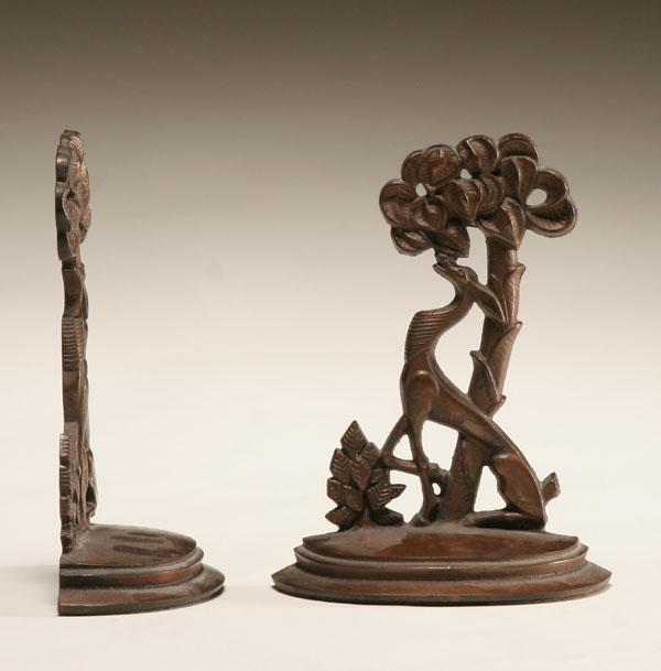 Appraisal: Pair of Art Deco cast iron bookends a with a