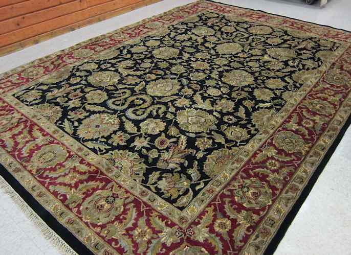 Appraisal: HAND KNOTTED ORIENTAL CARPET Indo-Persian having an overall floral arabesque