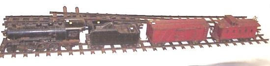 Appraisal: Buddy L metal outdoor train set including a locomotive l