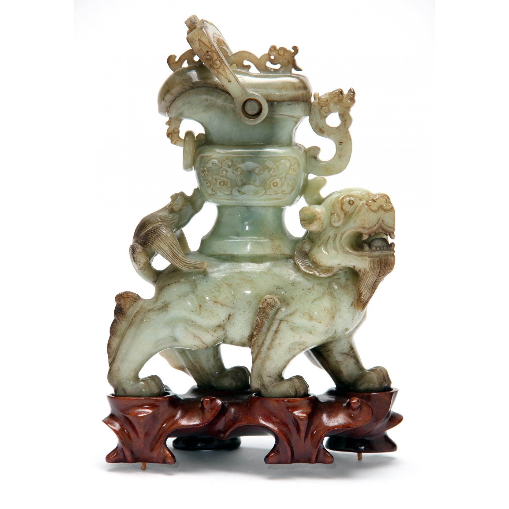 Appraisal: Chinese Fu Lion Jade Vessel highly stylized fu lion with