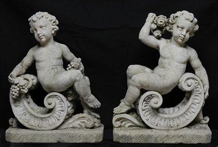 Appraisal: PAIR OF LIMESTONE CHERUBS x x in and x x