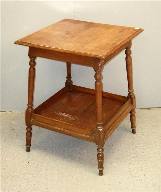 Appraisal: Early th century walnut Aesthetic style two tier table on