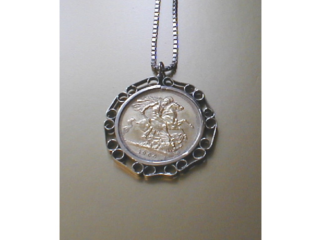 Appraisal: A sovereign set as a pendant including chain