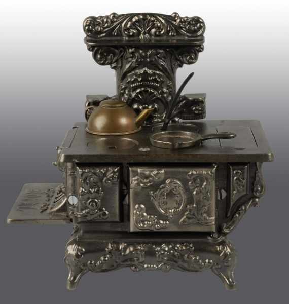 Appraisal: Cast Iron Arcade Royal Children's Stove Description Includes accessories Condition