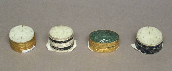 Appraisal: Four export hardstone mounted small covered boxes The tops of