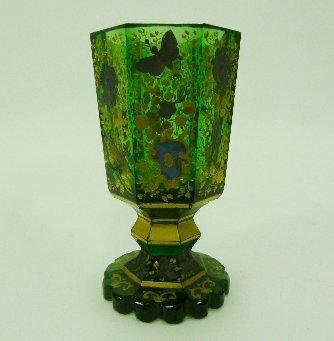 Appraisal: A Bohemian seven-sided green glass goblet with gilt and silvered