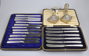 Appraisal: Two cased sets of tea knives with loaded silver handles