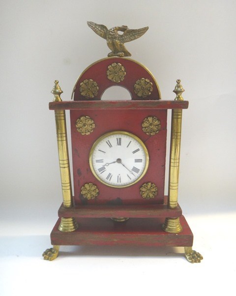 Appraisal: An Empire style mantel clock with eagle surmount over a