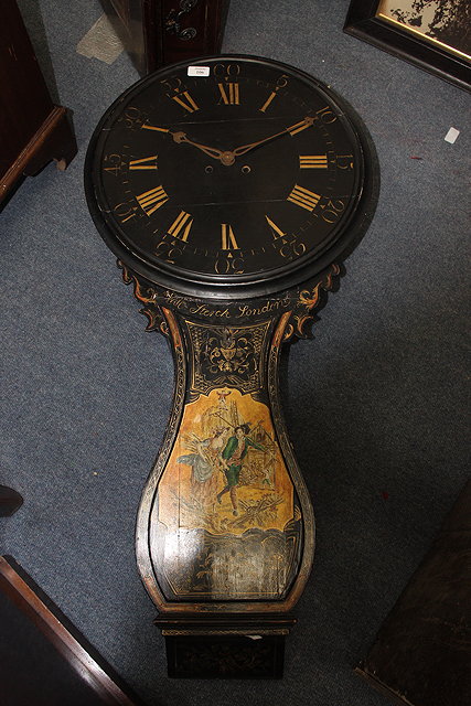 Appraisal: A GEORGIAN STYLE BLACK LACQUERED TAVERN CLOCK the dial with