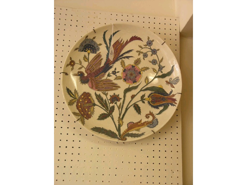 Appraisal: A wall plate probably Zsolnay Pecs painted with an exotic