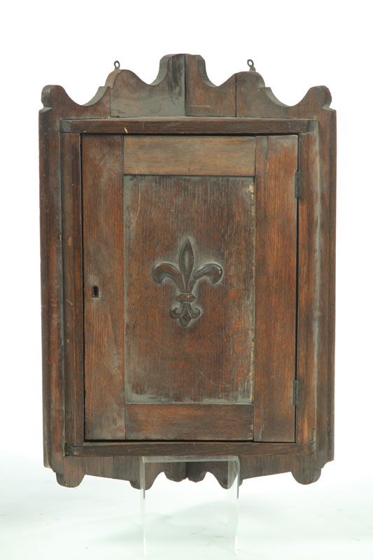 Appraisal: DIMINUTIVE HANGING CORNER CUPBOARD European late th-early th century oak