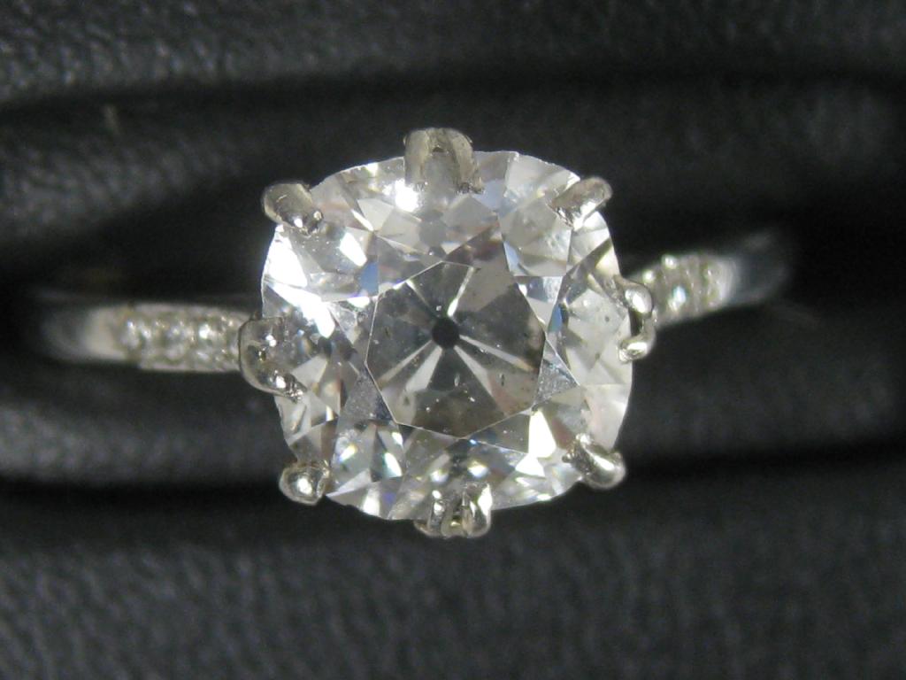 Appraisal: A single stone Diamond Ring the circular-cut stone in scrolled