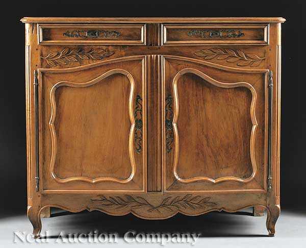 Appraisal: A French Provincial Carved Walnut Buffet late th early th