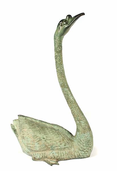 Appraisal: A patinated bronze figure of a swan height in width