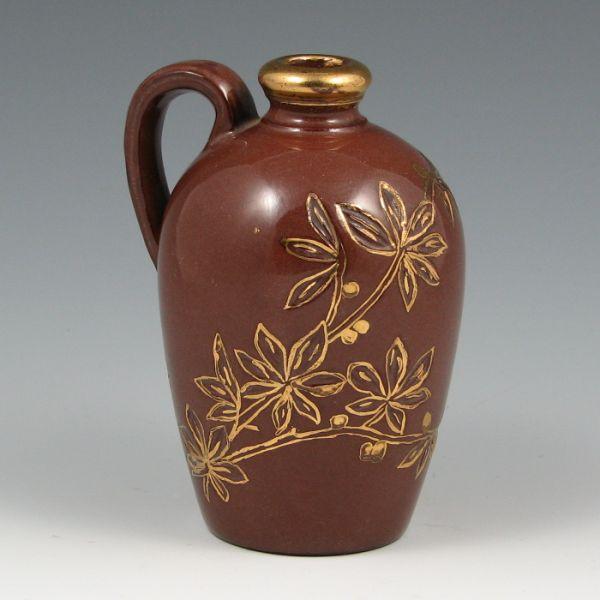 Appraisal: Cute perfume jug with carved berry and leaf design in