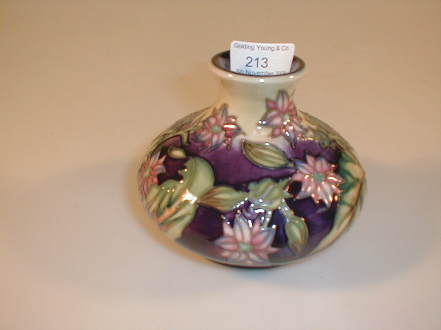 Appraisal: A modern Moorcroft squat globular vase with pink floral decoration