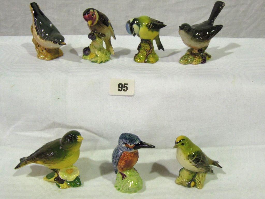 Appraisal: A collection of seven Beswick birds including nuthatch green finch