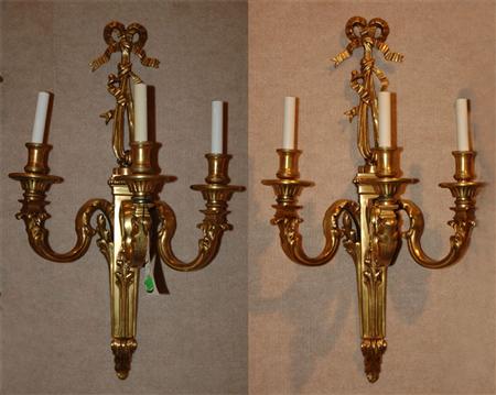 Appraisal: Pair of Neoclassical Style Ribbon Decorated Bronze Three-Light Sconces Estimate