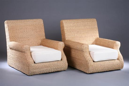 Appraisal: PAIR WOVEN WATER HYACINTH INDOOR CLUB CHAIRS th century Smith