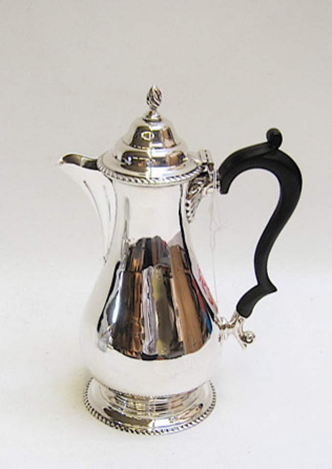 Appraisal: ENGLISH STERLING SILVER COFFEE POT with ebonized wood handle hallmarked