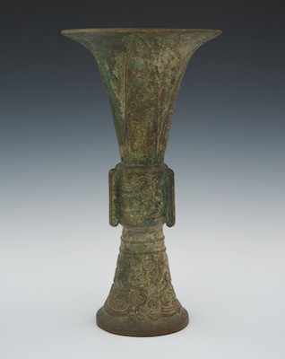 Appraisal: A Chinese Shang Style Bronze Gu Form Vase A decorative