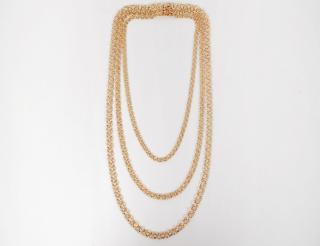 Appraisal: THREE STRAND FOURTEEN KARAT YELLOW GOLD NECKLACE Graduated lengths of