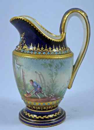 Appraisal: A Sevres Jug handpainted all around with various scenes gilded