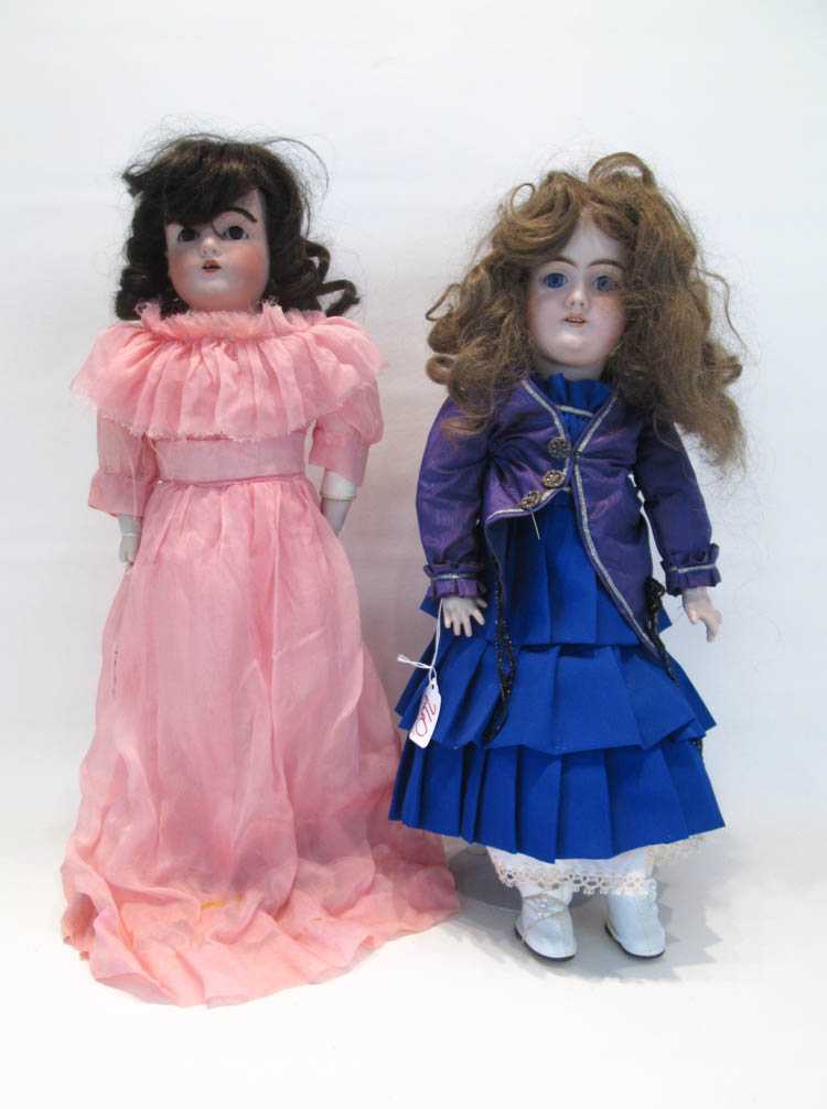 Appraisal: TWO GERMAN BISQUE HEAD CHILD DOLLS Heinrich Handwerck socket head