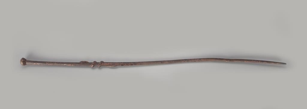 Appraisal: in long An ornately carved cane with incised detail and