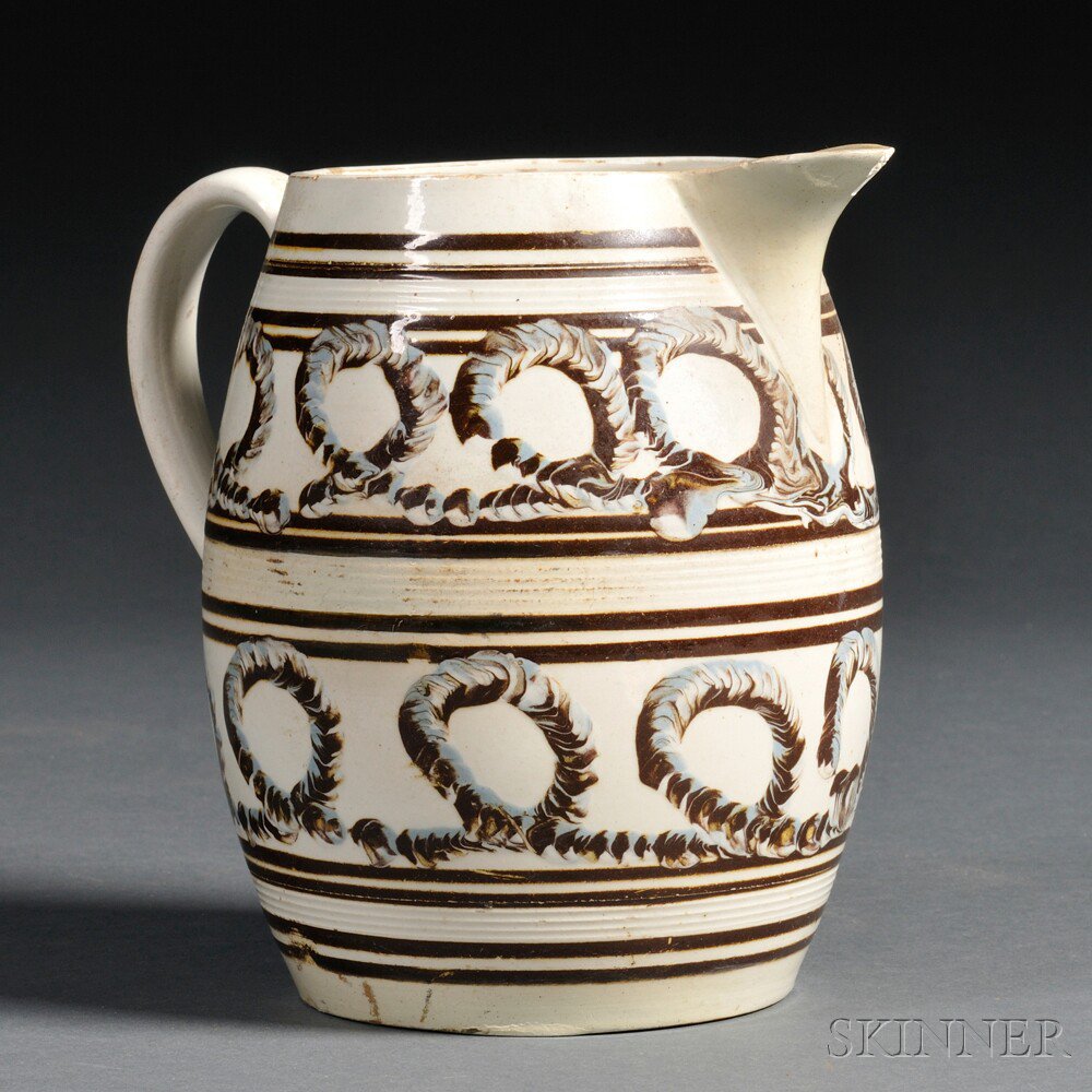 Appraisal: Mochaware Pitcher with Earthworm Decoration Britain th century barrel-form pitcher