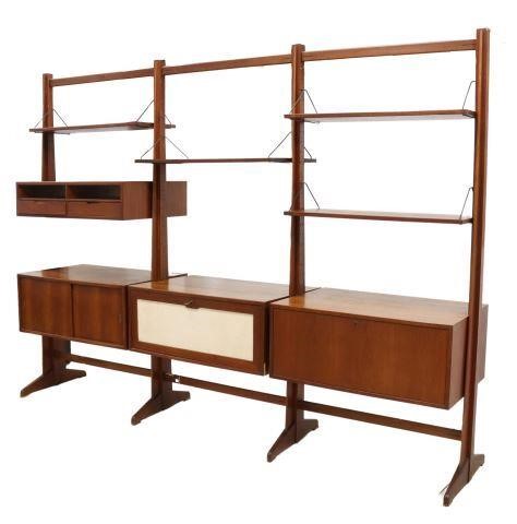 Appraisal: Italian mid-century modern teak three-unit bookcase c s having shaped