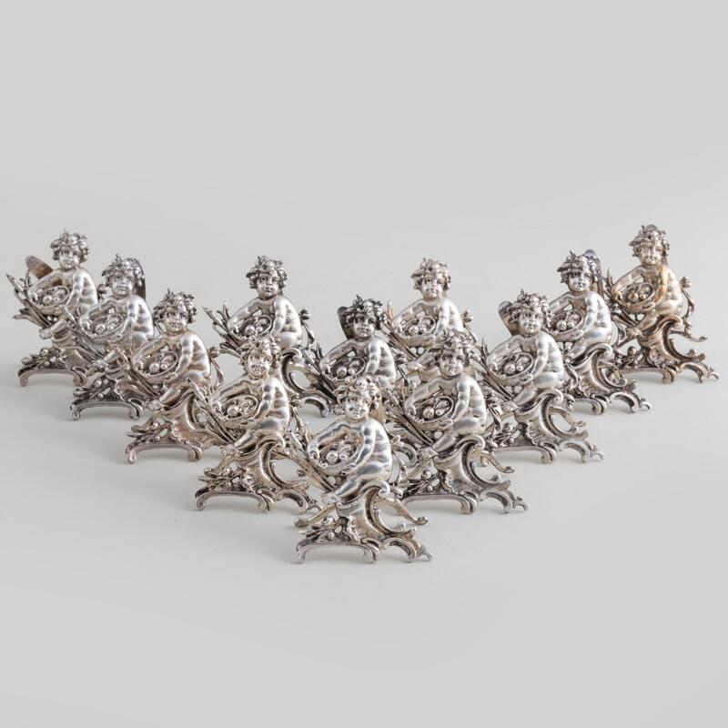 Appraisal: Twelve Continental Silver Cherub Place Card Holders Marked ' '