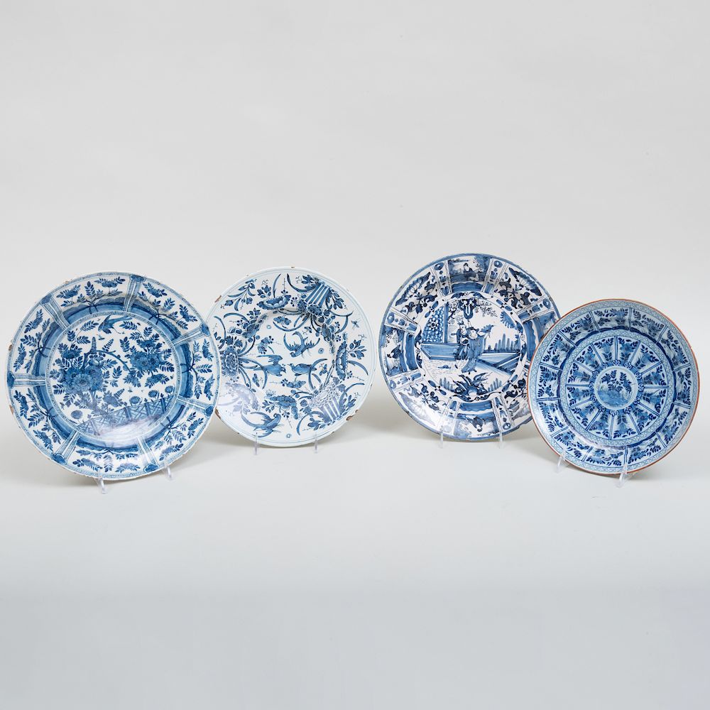 Appraisal: Group of Four Delft Plates Comprising A plate decorated with